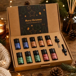 Holy Scents of Christmas Luxury Fragrance Oil Gift Set displayed in an open premium gift box on a rustic wooden table with festive fragrance oils, glass droppers, pine cones, evergreen sprigs, warm candlelight and soft seasonal textiles in a cosy Christmas slow living setting.