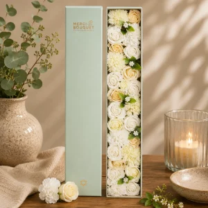 Wedding Soap Flower Gift Box featuring elegant white and ivory floral soap blooms beautifully presented in a luxury display box on a rustic wooden table with soft linen, ceramic accessories and warm natural light, creating a timeless slow living gift scene perfect for weddings and celebrations.