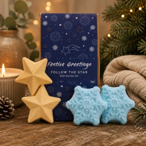 Follow the Star Christmas Bath Bomb Gift Set with handcrafted snowflake and star bath bombs displayed in a cosy festive setting.