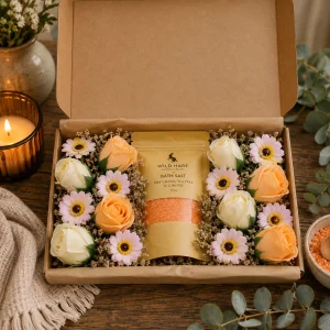 Salt Soak Set – Total Detox displayed in an open kraft gift box with 350g May Chang, Tea Tree & Juniper bath salts surrounded by peach and cream soap roses and pink soap sunflowers.