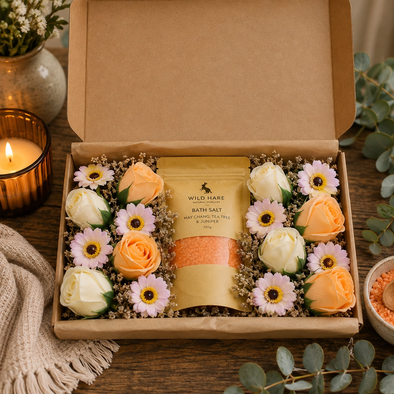 Salt Soak Set – Total Detox displayed in an open kraft gift box with 350g May Chang, Tea Tree & Juniper bath salts surrounded by peach and cream soap roses and pink soap sunflowers.